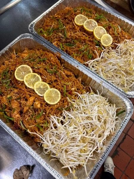 Pad Thai noodles in catering trays